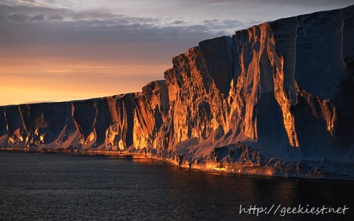 Adelie Sea, cliffs in sunset, Antarctica